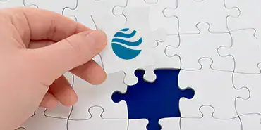 Umwandlung Portal Systems AG Ein Puzzlestück mit dem Portal Systems Globe.