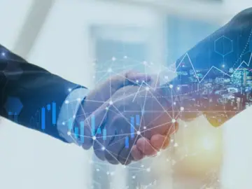 A handshake as a symbol of the partnership from which both Modus Consult and Portal Systems stand to benefit.